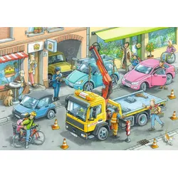 Müllabfuhr und Abschleppwagen