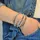 Steuer Armband Kunstleder grau glänzend 67cm