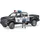 Bruder 02505 - Polizei Pickup mit Polizist schwarz/weiß 1:16