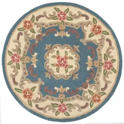 Kadima Design Traditioneller Wollteppich `Beauly` mit Handgeschnitzten Details. Farbe: Blau-Beige, 120x120 cm