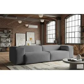KAWOLA Sofa CELESTE 4-Sitzer mit Hocker Cord grau