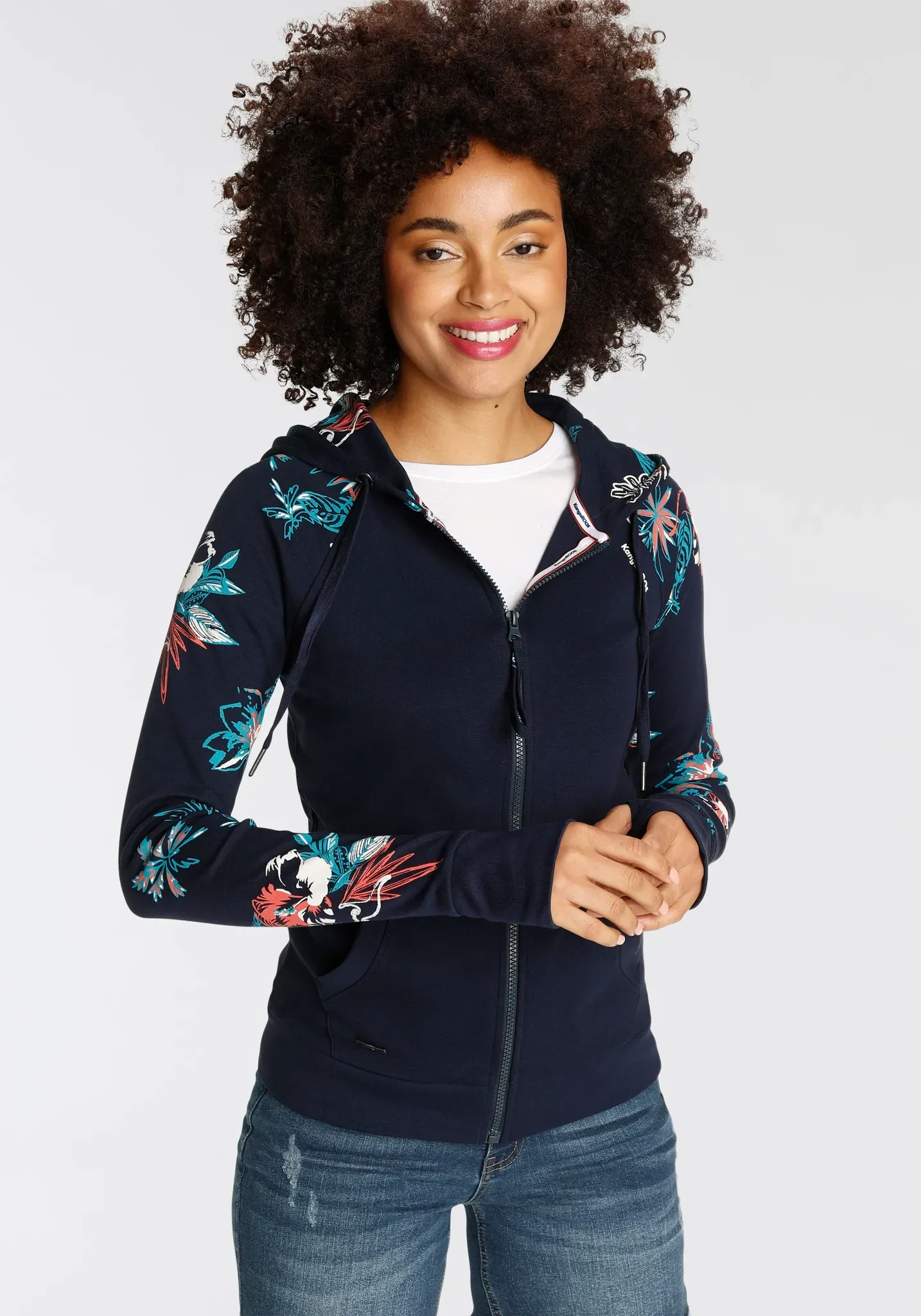 Kapuzensweatjacke KANGAROOS, Damen, Gr. 32/34, blau (marine), Interlock, Obermaterial: 100% Baumwolle, bedruckt, kontrastfarbene Details, unifarben mit Farbeinsatz, figurbetont hüftbedeckend, Raglanärmel Rippbündchen mit Daumenlöchern, Sweatjacken, mit blumigem Druck im Hawaii-Look, Topseller