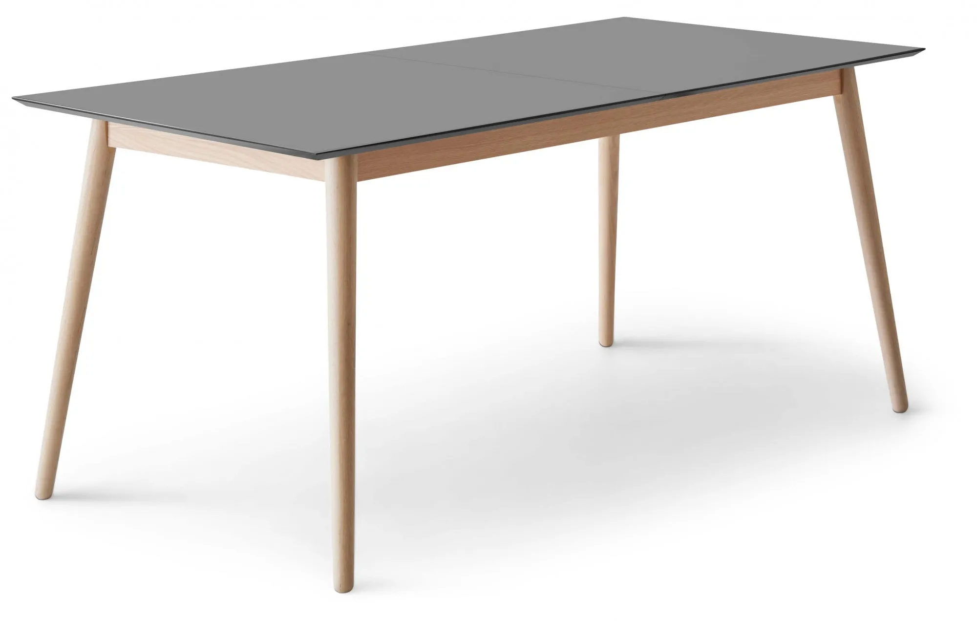 Esstisch HAMMEL FURNITURE "Meza Designtisch mit Auszugsfunktion und 2 Einlegeplatten", grau (graphit, eiche, laminat, mdf, eiche massivholzfüße), B:165cm H:74cm T:90cm, Tischplatte: Graphit nanobehandeltes Fenix-Laminat (schwarzer Rand), Gestell: Massive Eiche. Mit nanobehandeltem Laminat, einer matten, seidigen Oberfläche, die Fingerabdrücke abweist und langlebig und hygienisch ist., Tische, rechteckige Tischplatte MDF, Esche Massivholzgestell