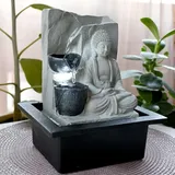 Tischbrunnen mit Pumpe Springbrunnen mit LED Beleuchtung Buddha Design Zimmerbrunnen grau Wohnzimmer Schlafzimmer Dekoration, LxBxH 21x18,5x25,5 cm
