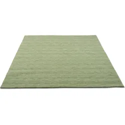 Wollteppich THEKO "Holi", grün (hellgrün), B:70cm H:13mm L:140cm, Schurwolle, Teppiche, Uni-Farben, leicht meliert, reine Wolle, handgewebt mit Knüpfoptik