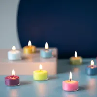 REMEMBER Teelicht-Set "Sydney" 9er-Set farbiger Teelichter - paraffinfrei, aus fairem Handel und aus veganem Stearinwachs