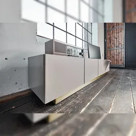KAWOLA Lowboard EMMA TV-Board Kunstleder grau Fuß Edelstahl messingfarben