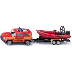 Land Rover Defender mit Boot