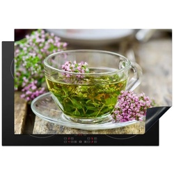 MuchoWow Herdblende-/Abdeckplatte Ein Majoran in einem Glas mit heißem Wasser, Vinyl, (1 tlg), 77×51 cm, Ceranfeldabdeckung, Arbeitsplatte für küche bunt 77 cm x 51 cm x 0.3 cm