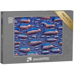 puzzleYOU Puzzle Klare Wassertropfen auf dunkelblauer Oberfläche, 100 Puzzleteile, puzzleYOU-Kollektionen Fotokunst