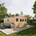 TIMBELA Gartenhaus 4,93 x 4,93 m Beige
