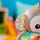 Bright Starts Grab & Giggle Monkey Rassel bunt