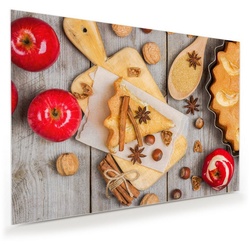 Primedeco Glasbild Wandbild Vorbereitung Apfelkuchen mit Aufhängung, Früchte rot 100 cm x 70 cm