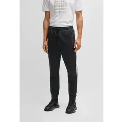 BOSS für Herren. 50537373 Trainingshose in lockerer Passform mit gewebten schwarzen Jacquard-Kreisen (XXL), Lässig, Polyester