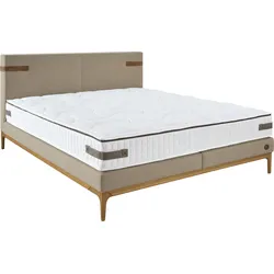 Boxspringbett BIRKENSTOCK "Iona", beige (graubeige cww 22), B:181,5cm L:218cm, Loden CWW (70% Wolle, 25% Polyamid, 5% andere Fasern), Scheuertouren 40000, Komplettbetten, Boxspringbett, mit Lederlaschen am Kopfteil, mit Holzsockel in Eiche natur