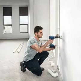 Bosch GSB 18V-65 inkl. 2 x 5,0 Ah + L-BOXX