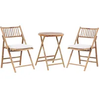 Beliani Balkonset Bambusholz Tisch Rund 57 cm mit 2 Klappbaren Stühlen Auflagen Cremeweiß Landhaus Stil Terrasse Balkon Garten Möbel - Balkontisch, Hellbraun cremeweiss zusammenklappbar SAVALLETRI (49