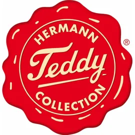Teddy-Hermann Australian Shepherd Welpe sitzend