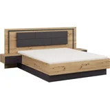 Rauch Bettanlage RAUCH "Bett Doppelbett Komortbett BILBAO-EXTRA", eiche artisan, graumetallic, B:265cm H:109cm T:207cm, Holzwerkstoff, Schlafzimmermöbel-Sets, Bettanlage, Polster-Kopfteil in Lederoptik basalt, mit Beleuchtung MADE IN GERMANY