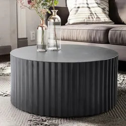 Kadima Design Runder Sofatisch mit Wellen-Muster, Couchtisch Metall Schwarz. 67x67x31 cm