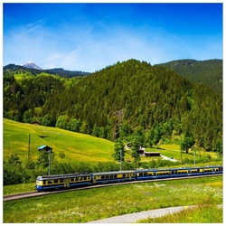 Wallario Möbelfolie Eisenbahn in einer Sommerlandschaft in der Schweiz gelb