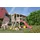 Akubi Stelzenhaus Benjamin Set A terragrau mit Rutsche rot 91208